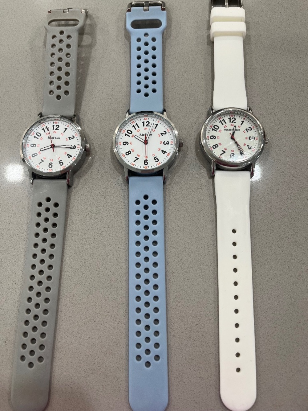Water-resistant watches. Gray, Blue and White. Need batteries.